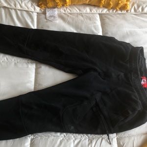 Black Nike tech sweatpants